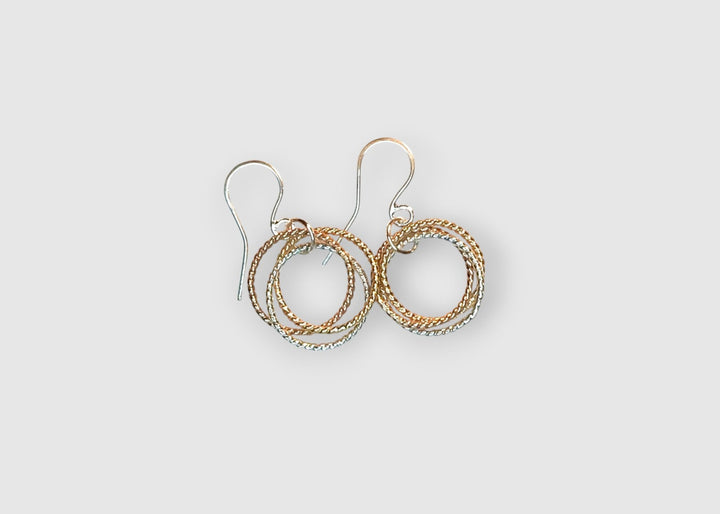 Mixed metal rope earrings on white background wil handcrafted earwires